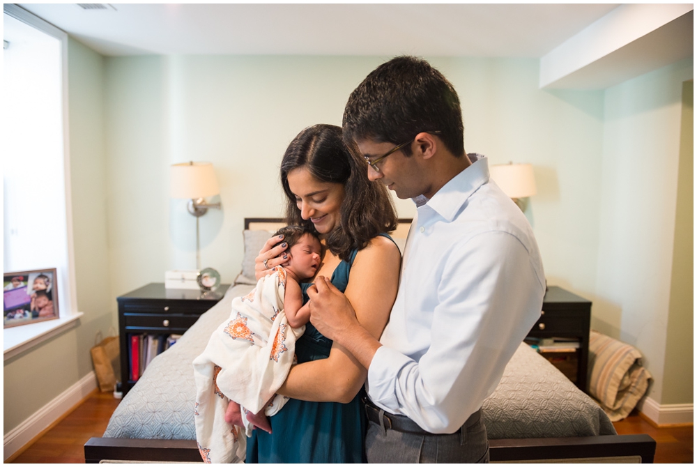 Parents With Newborn Baby Girl In Home