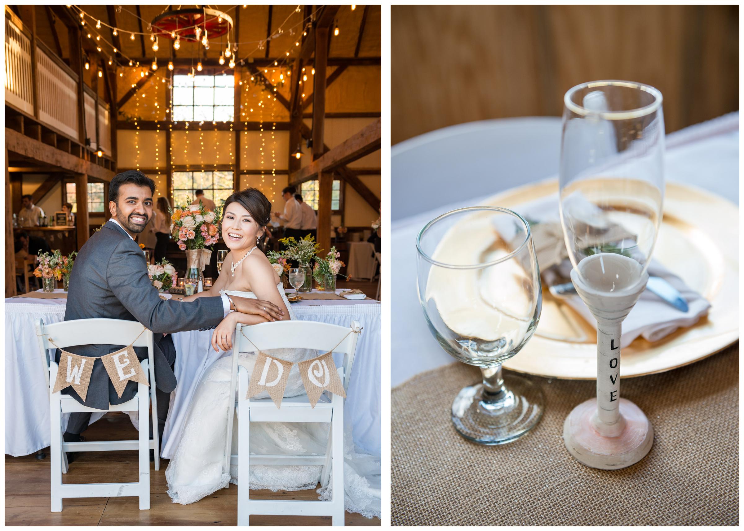 Bride and groom with twinkle lights at rustic wedding reception in barn at Stoneleigh Golf Club