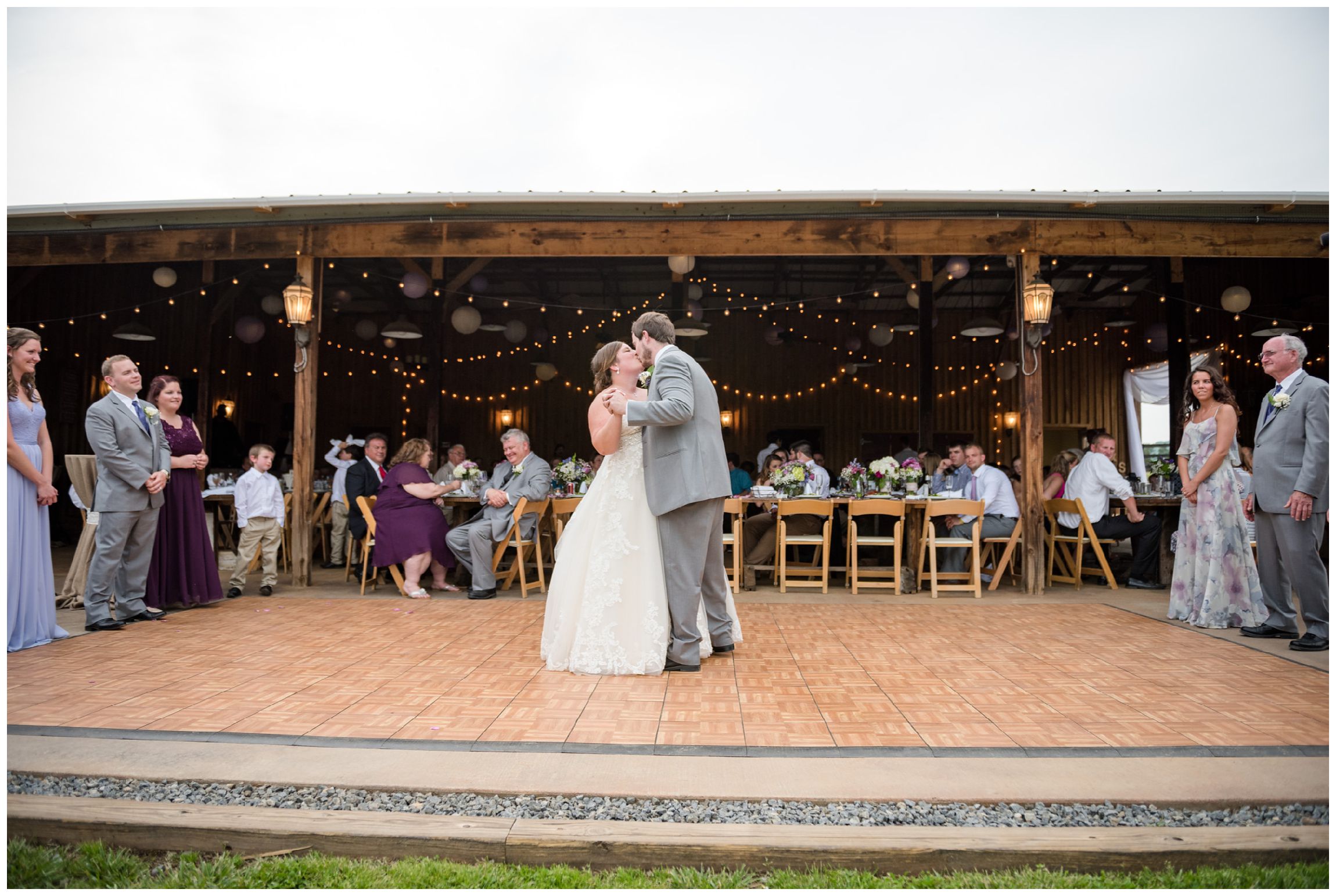 bride and groom sharing first dance at rustic barn wedding in Virginia