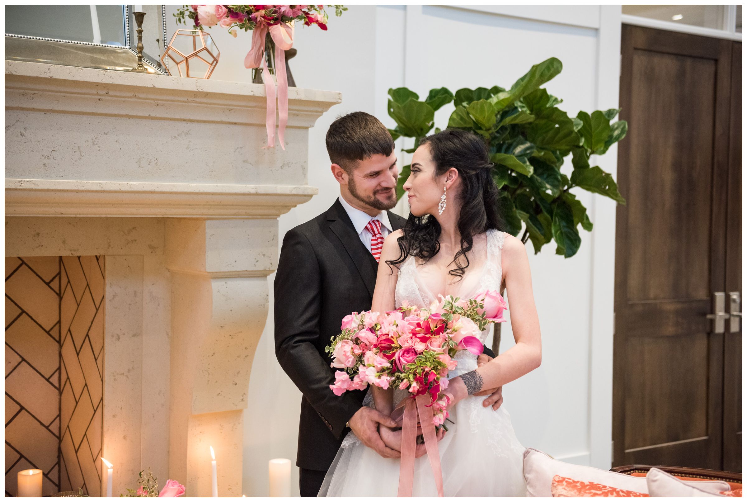 bride and groom near fireplace at the Estate at New Albany wedding venue near Columbus, Ohio