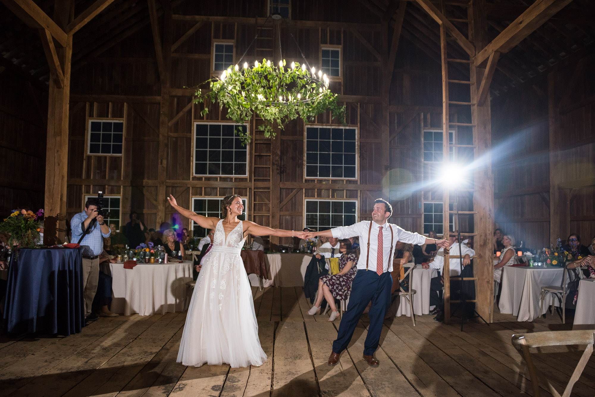 bride and groom's first dance during rustic barn wedding reception in Lancaster Ohio