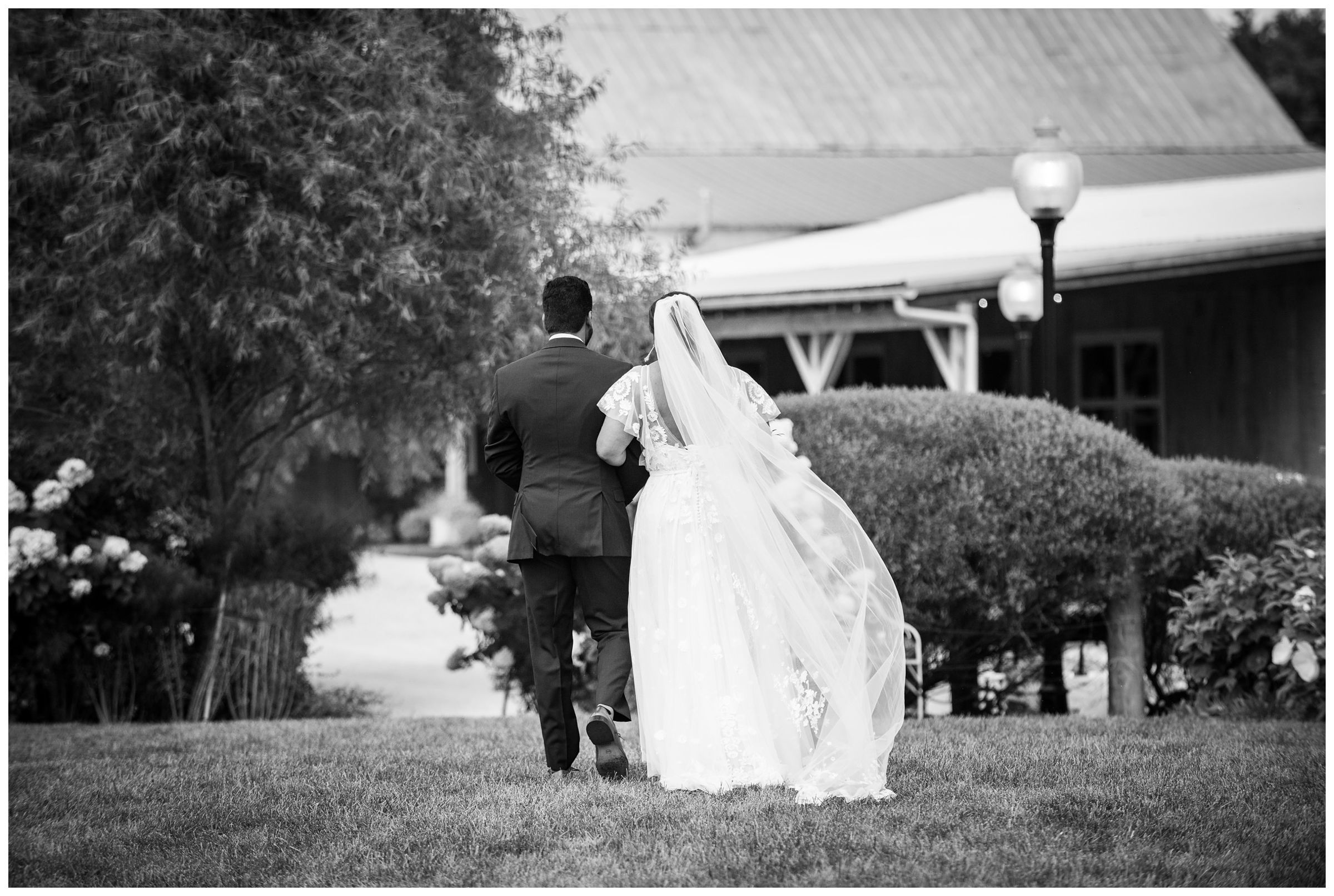 Bride and groom after wedding ceremony at Jorgensen Farms Historic Barn in Columbus