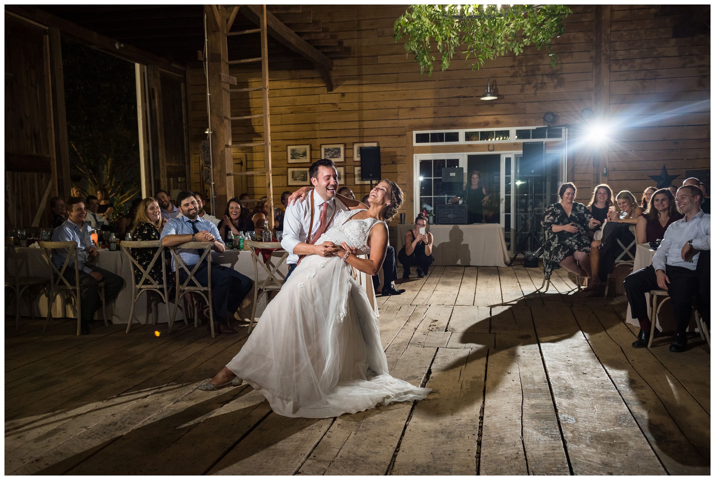 bride and groom sharing their first dance during rustic barn wedding at family farm in Lancaster Ohio