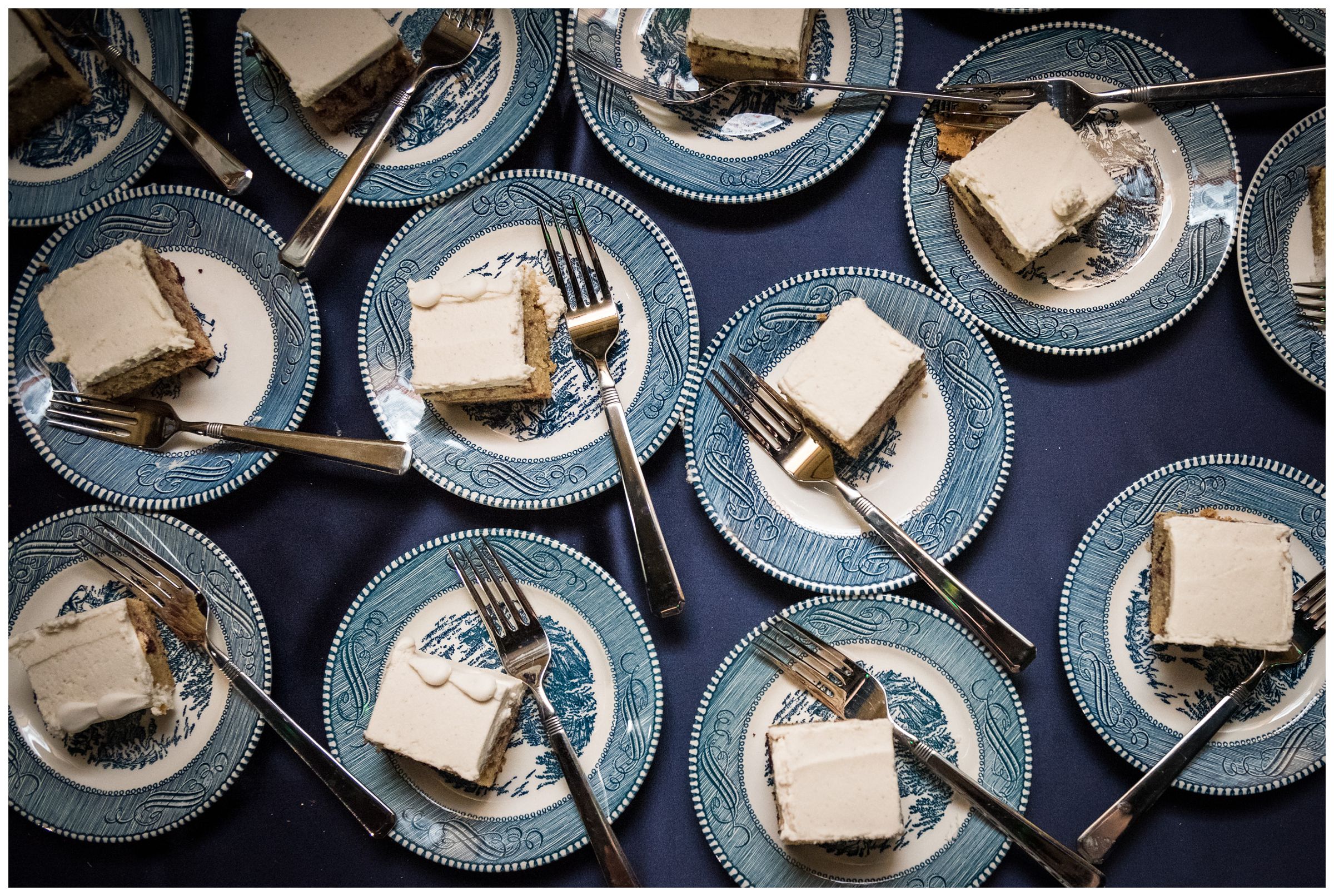 wedding cake on blue vintage plates during Columbus Ohio wedding