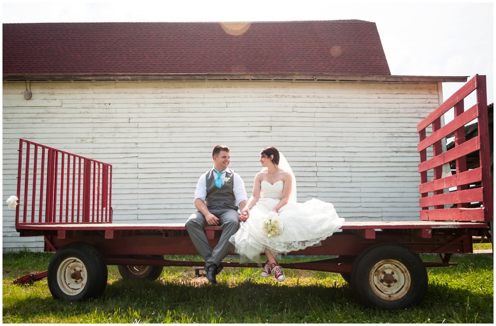 bride and groom portrait in rustic barn wedding