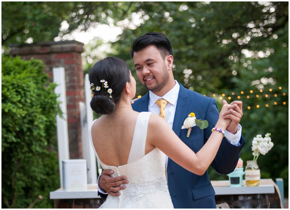 bride and groom first dance at wedding reception