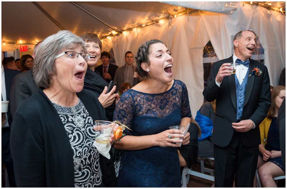 guests reacting to wedding toast