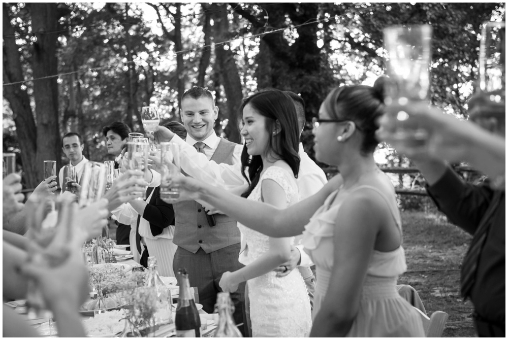 bride toasting at wedding reception