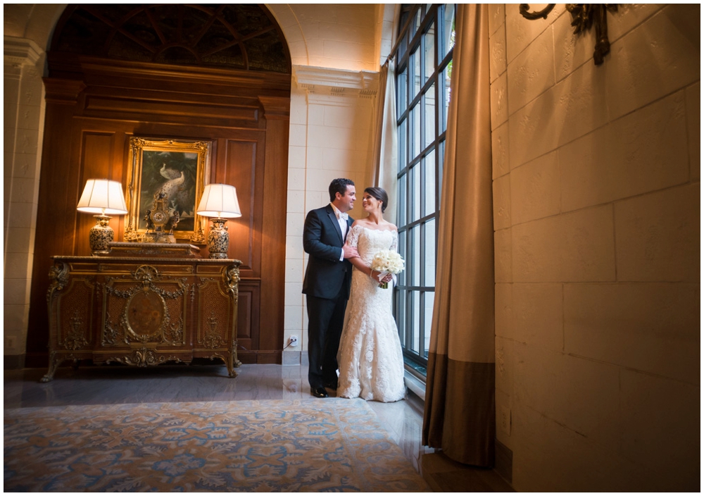 bride and groom portrait in hotel lobby