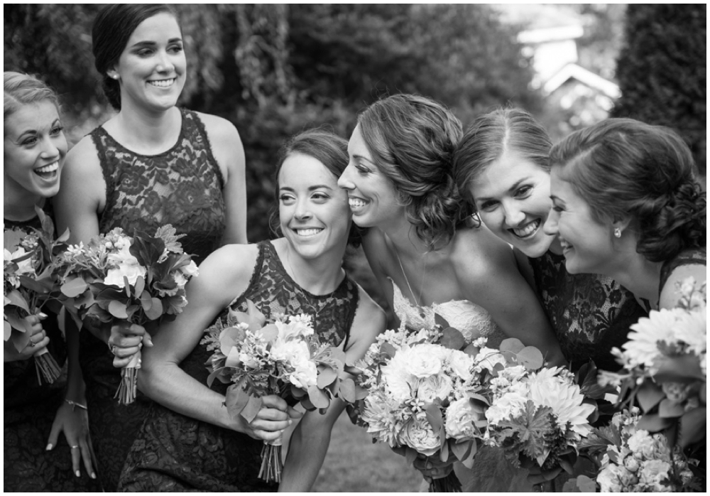 bride laughing with bridesmaids