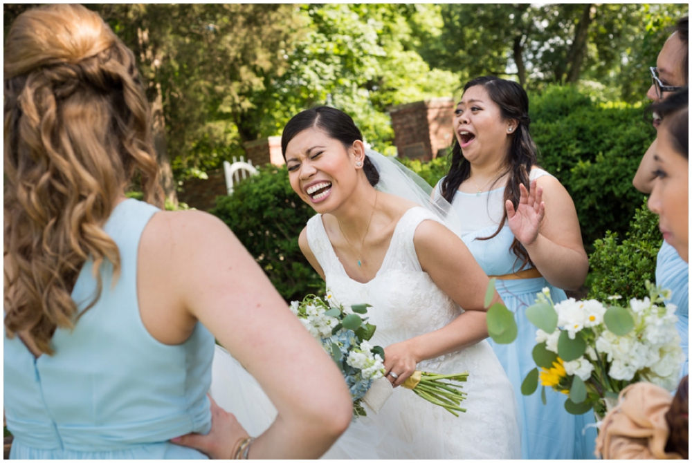 bride laughing with bridesmaids