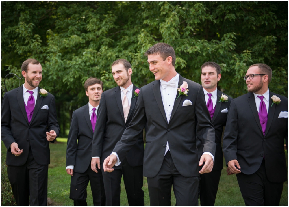 groom walking with groomsmen