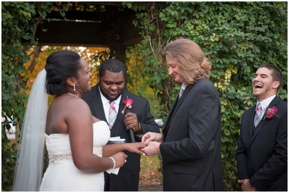 exchanging rings during wedding ceremony