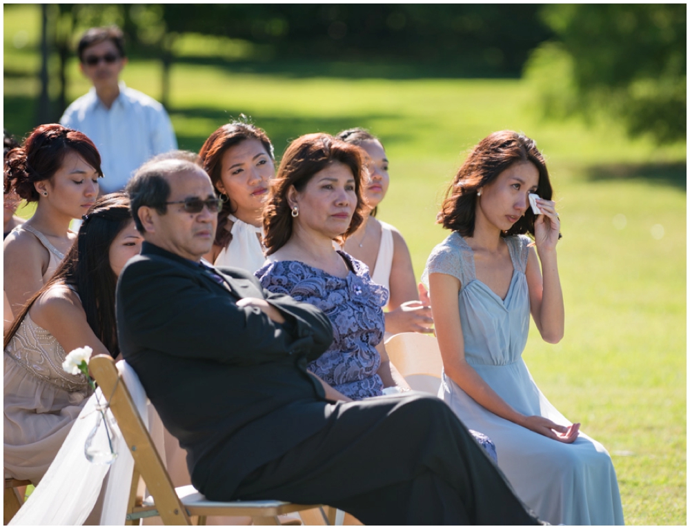 family crying during wedding ceremony