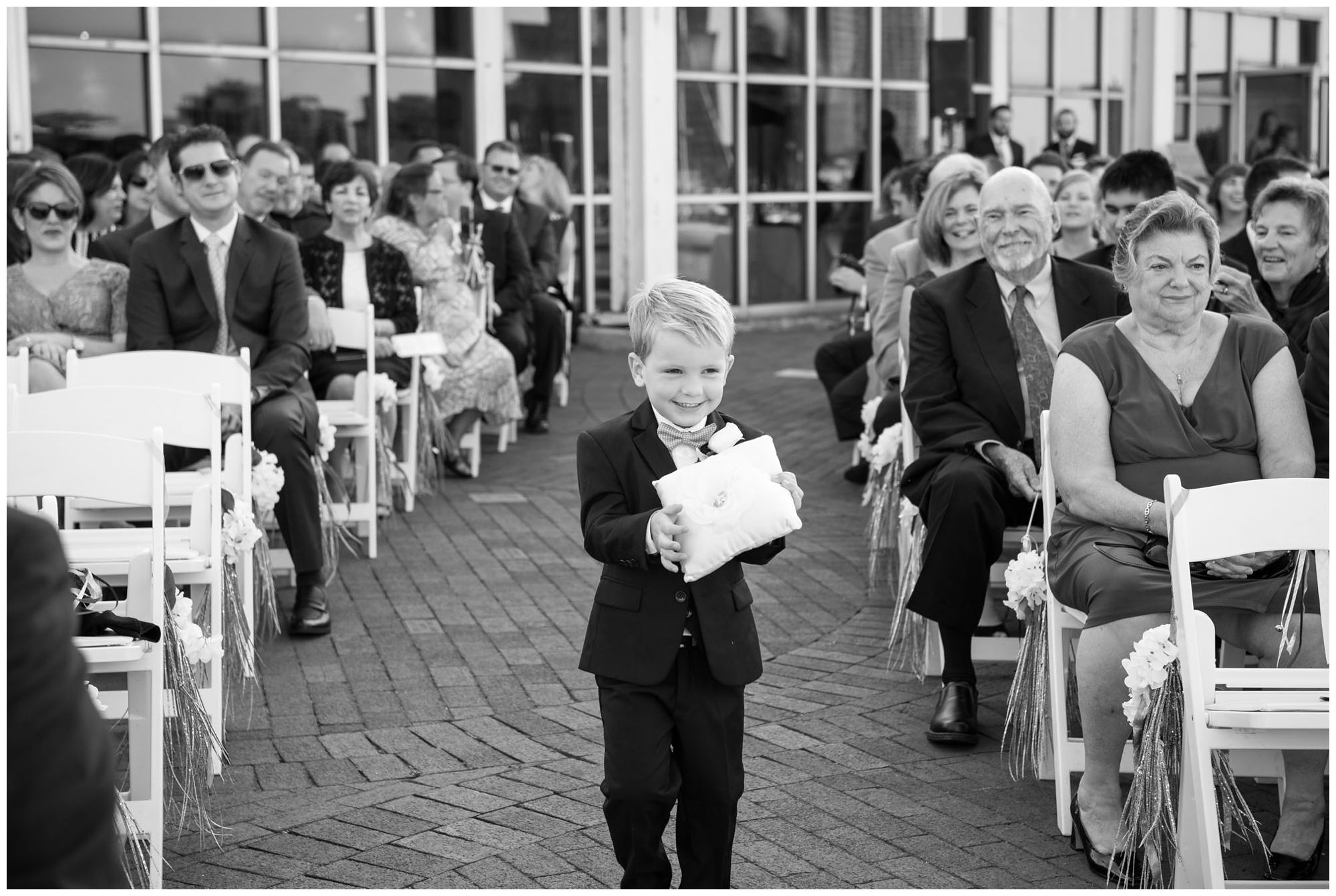 Ring bearer in harbor wedding at Baltimore Museum of Industry