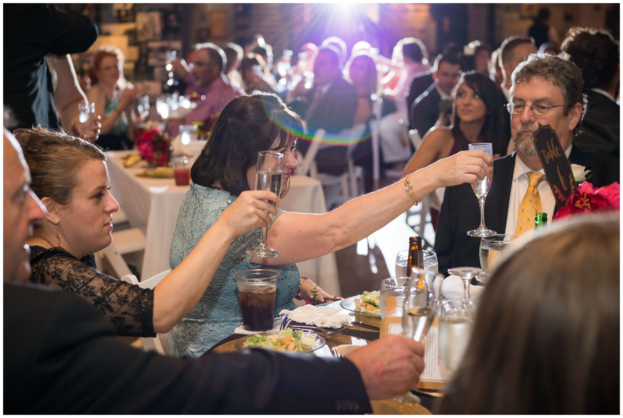 Toasts during wedding reception at Baltimore Museum of Industry