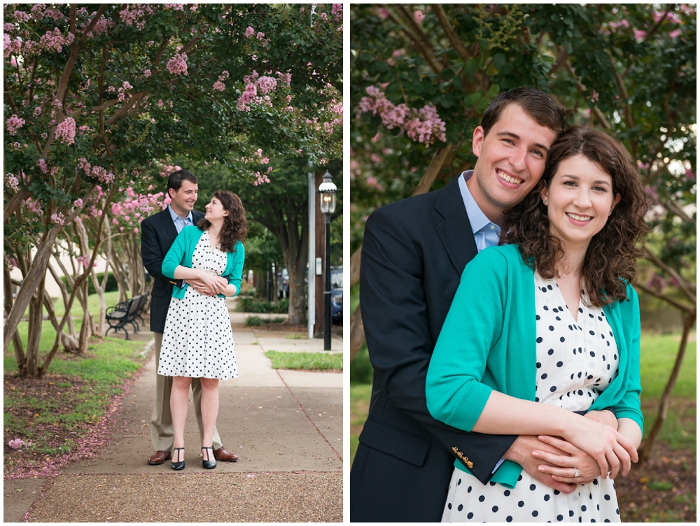 engaged couple on sidewalk