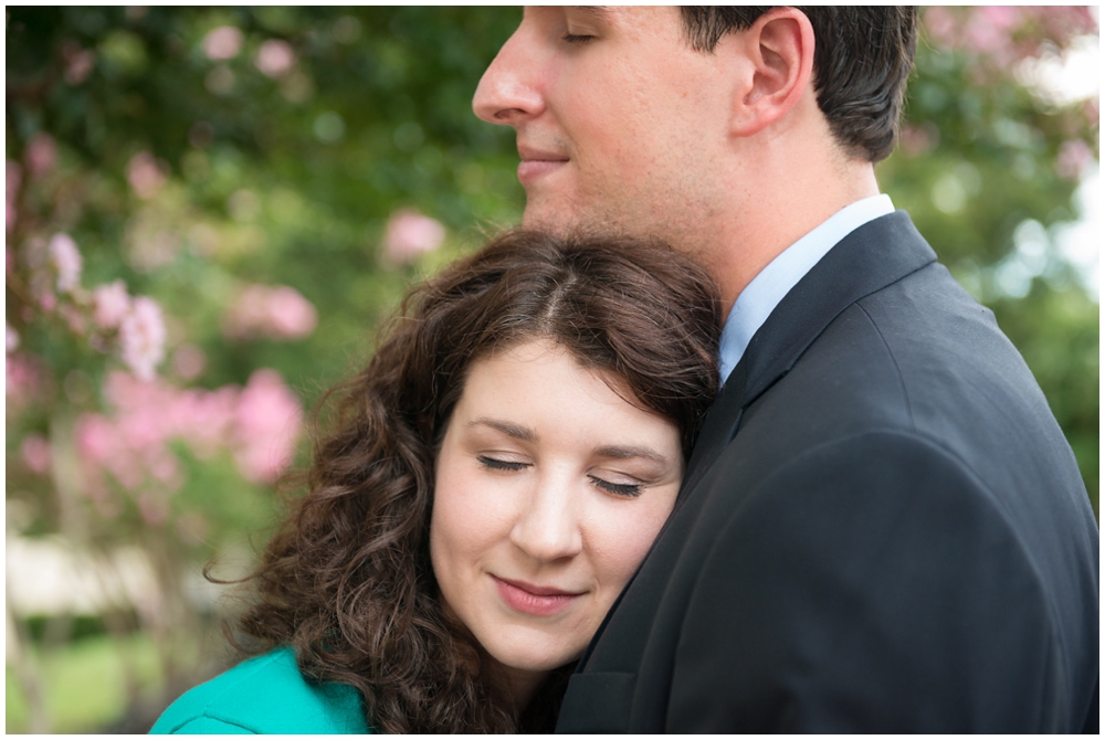 closup of engaged couple hugging