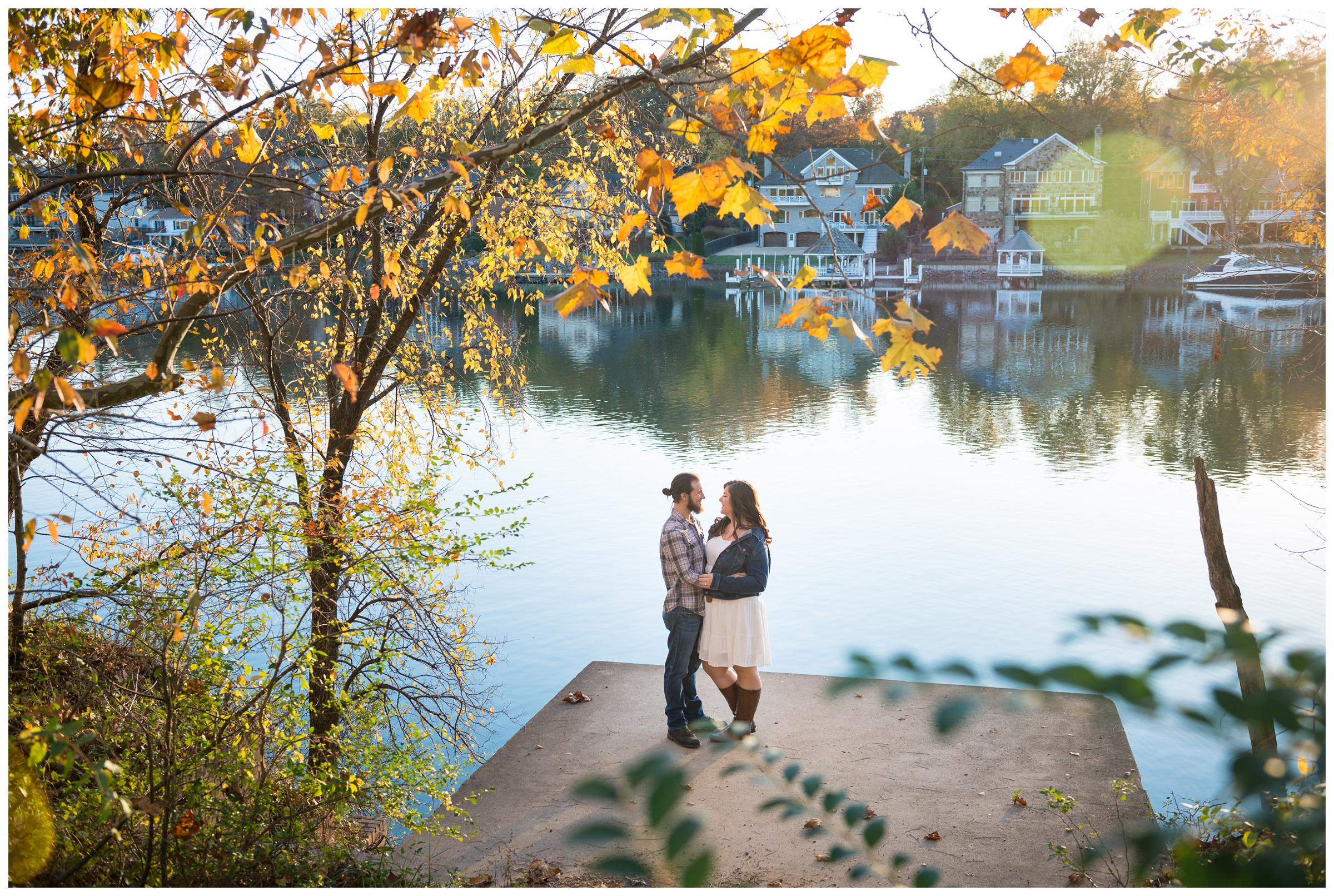 engaged couple near river in Virginia