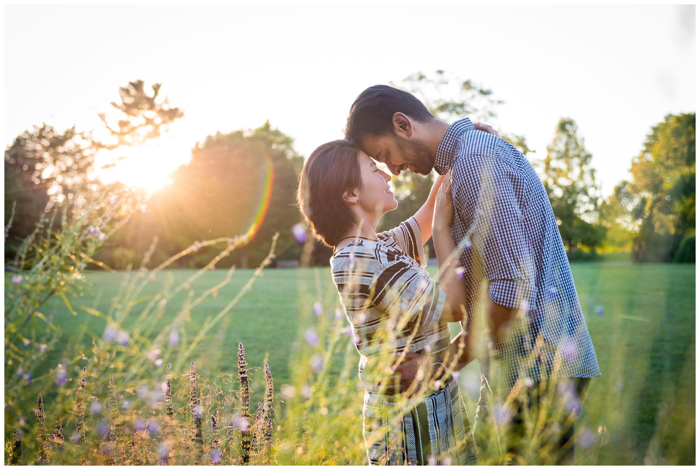 engaged couple at Virgina park with sun flare