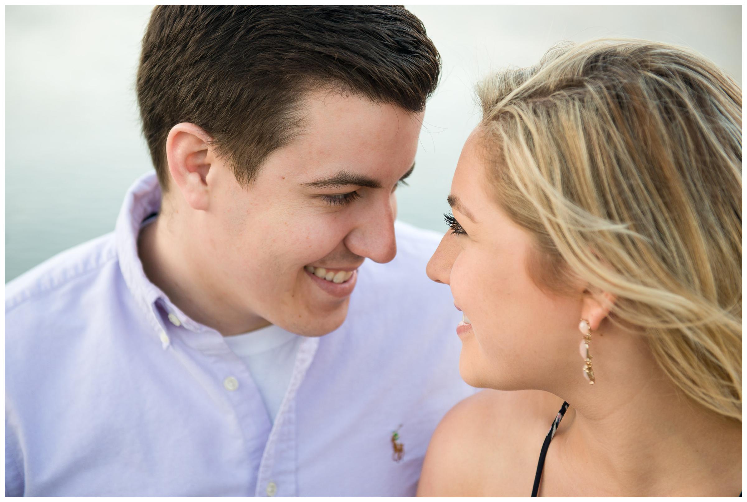 closeup of engaged couple near river