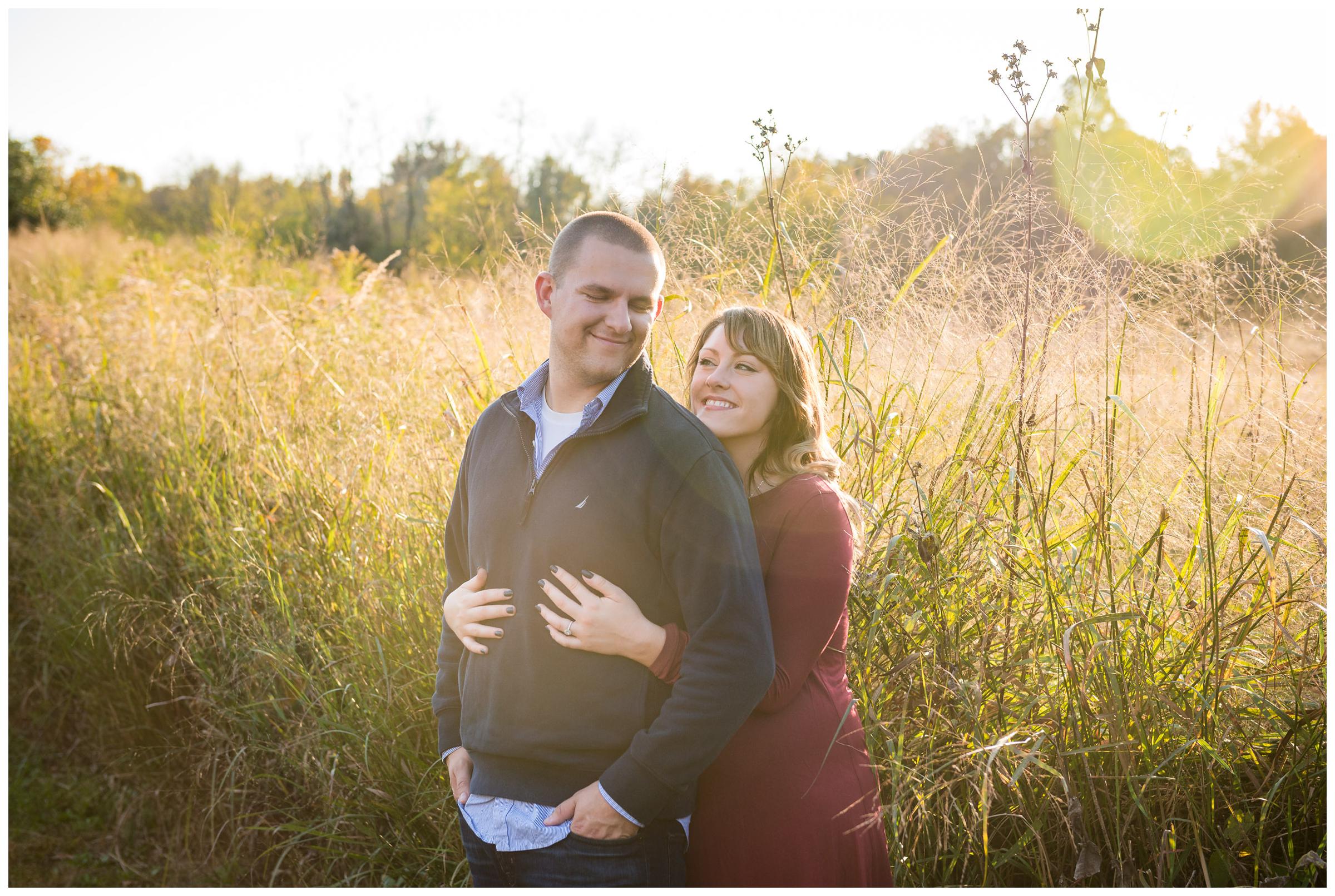 golden hour engagement session in field