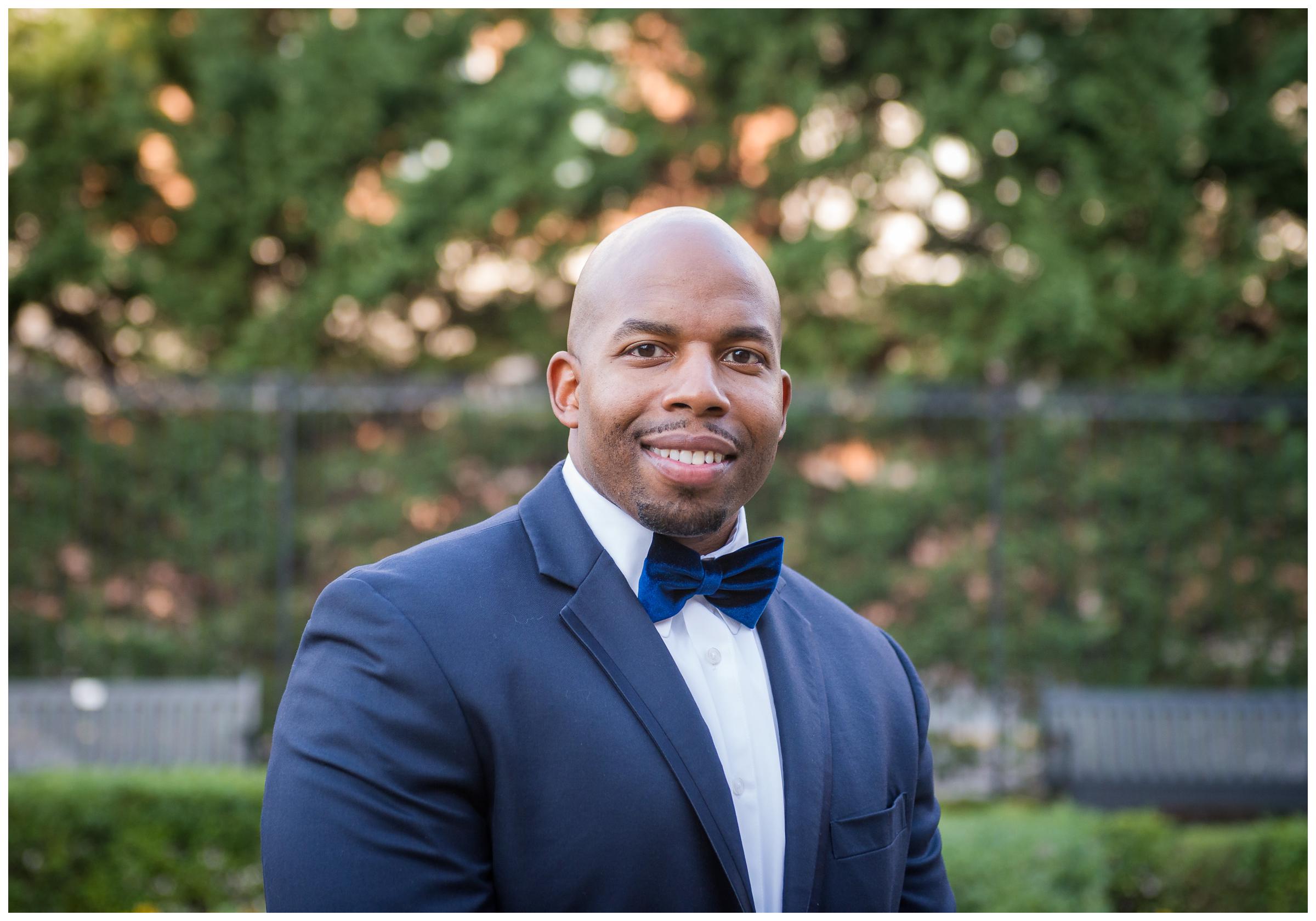 groom in blue suit