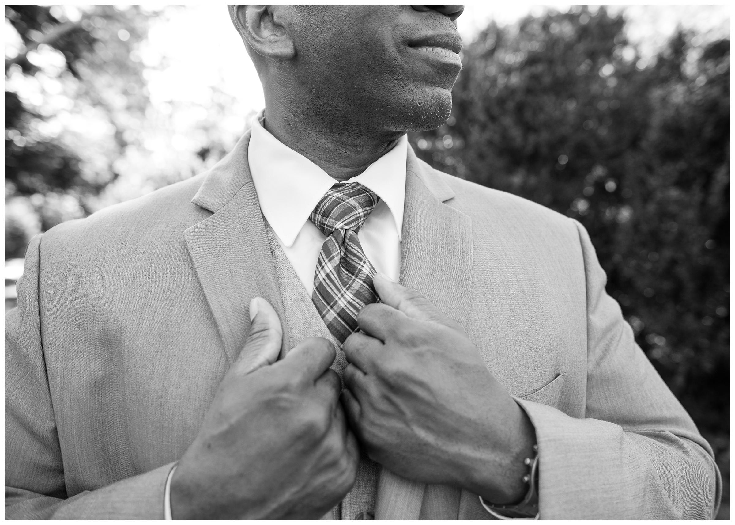 groom in grey suit