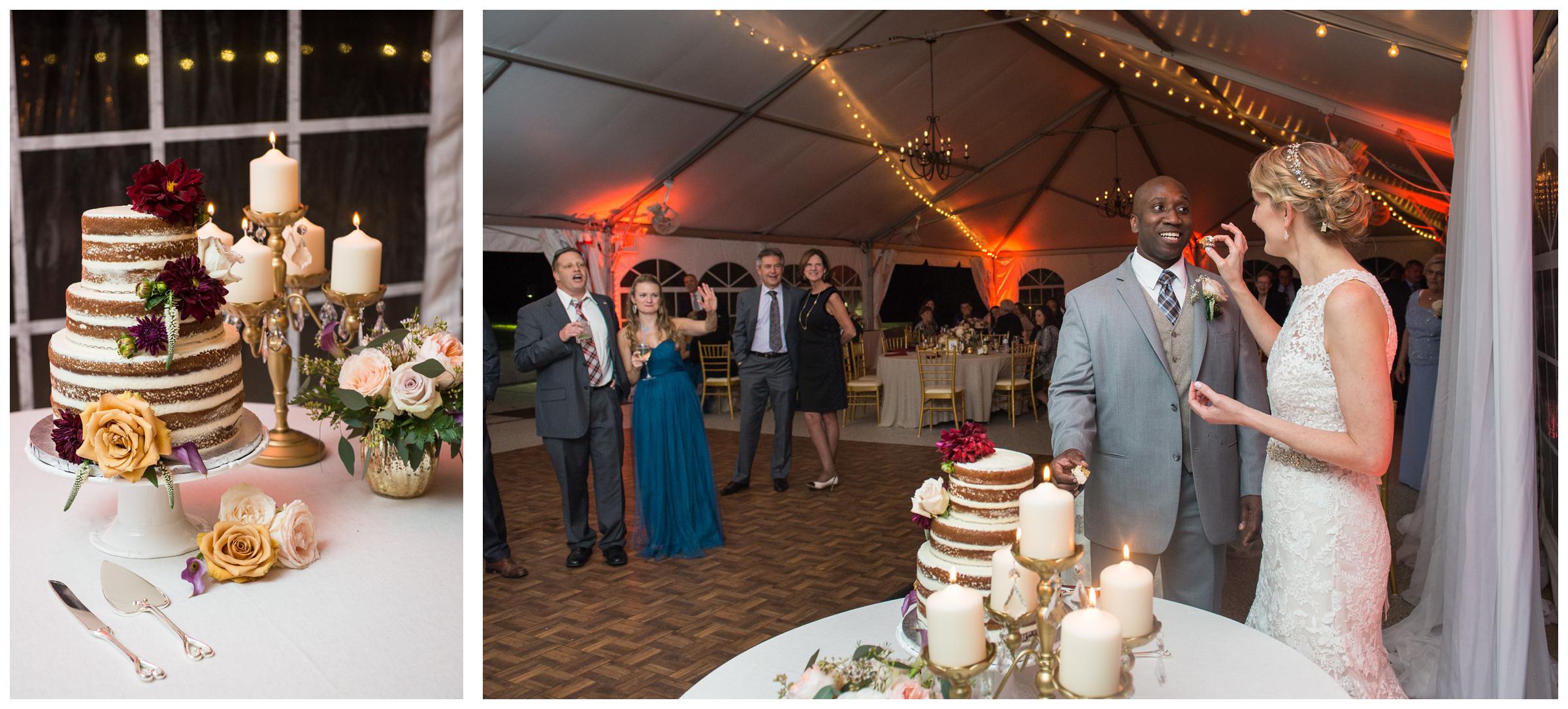 bride and groom cutting cake at wedding reception