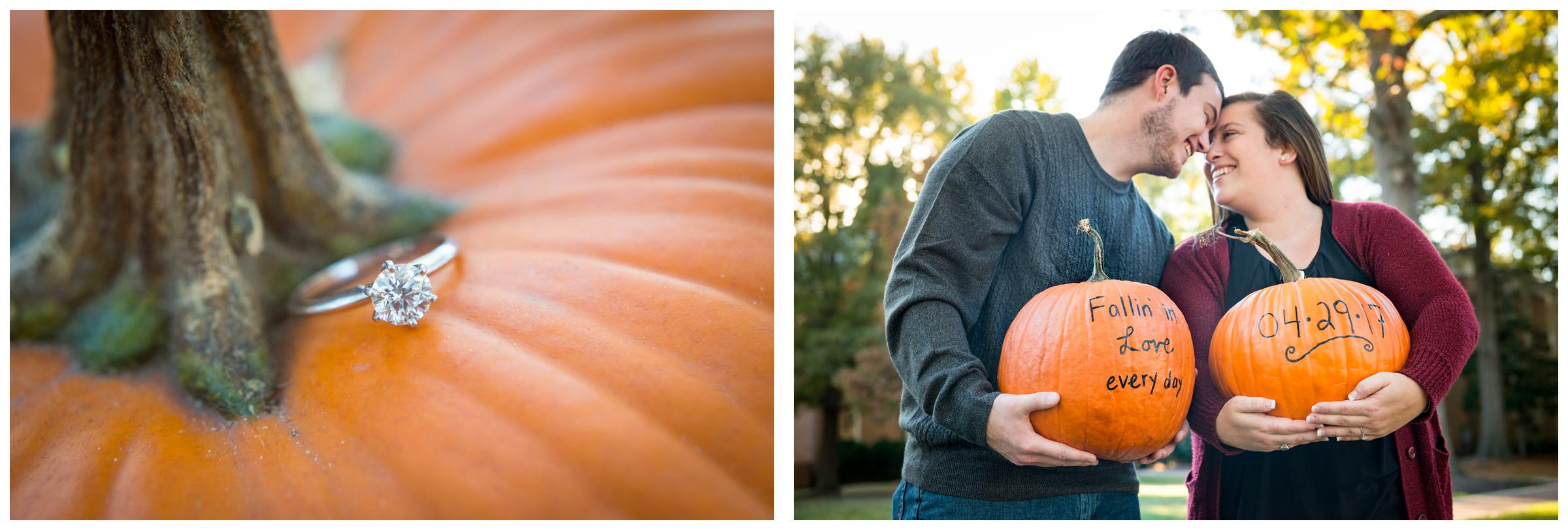 Engaged couple holding pumpkins with wedding date written on them.