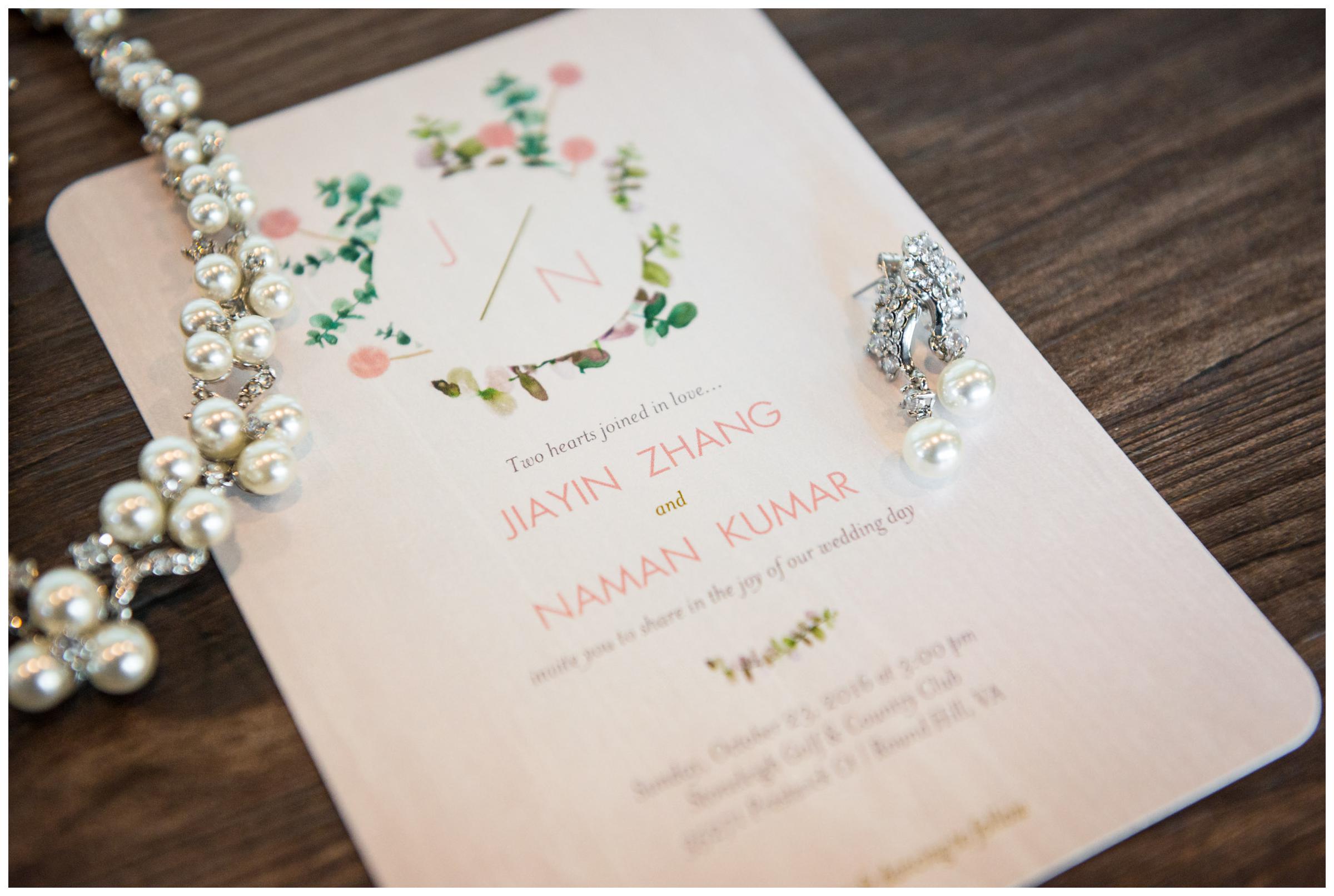 rustic wedding invitation with bride's jewelry