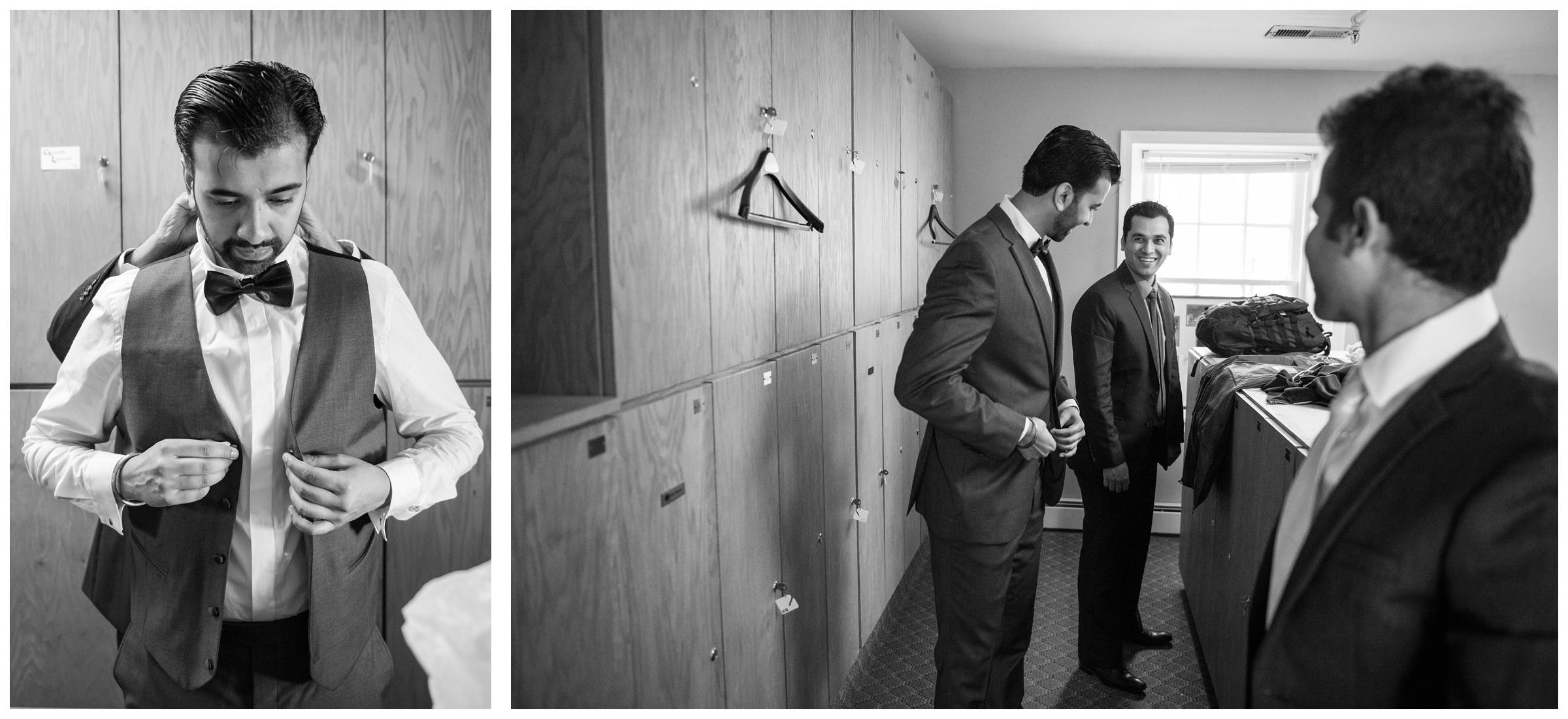 Groom getting dressed with groomsmen before wedding ceremony.