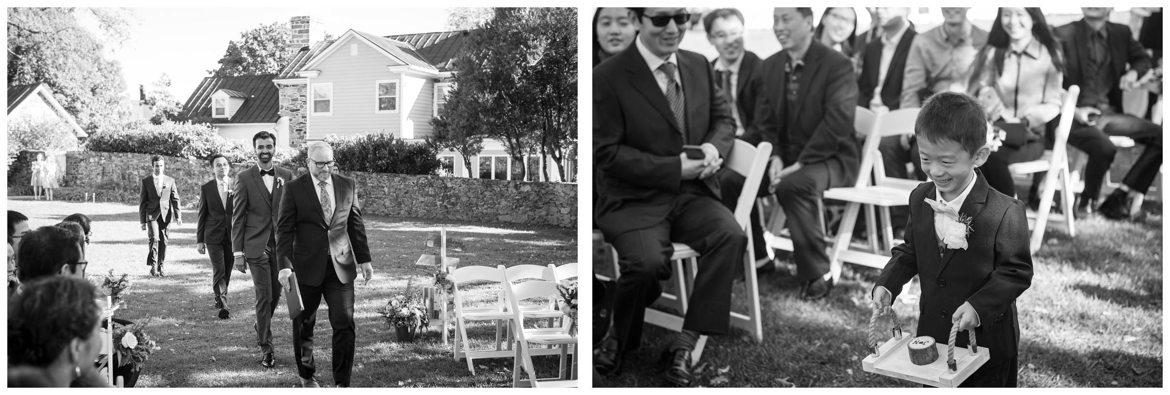 Groomsmen and ring bearer entrance during outdoor wedding ceremony.