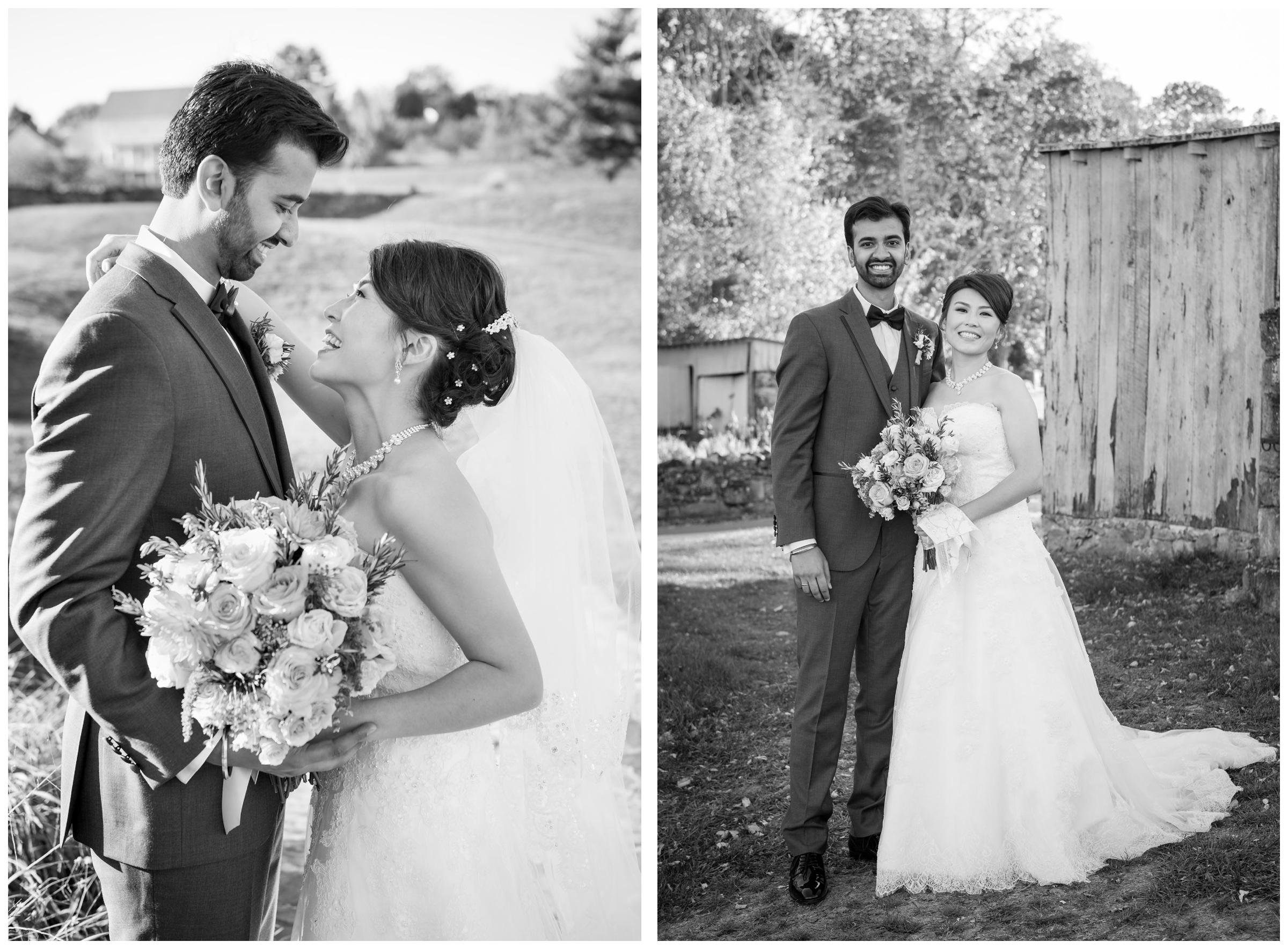 Portrait of bride and groom near stone ruins at rustic wedding.