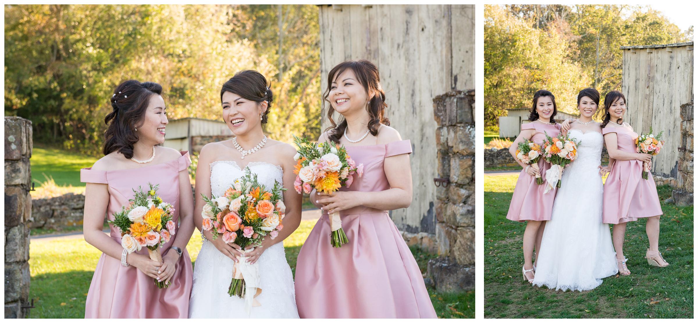 Portrait of bridesmaids near stone ruins at rustic wedding.