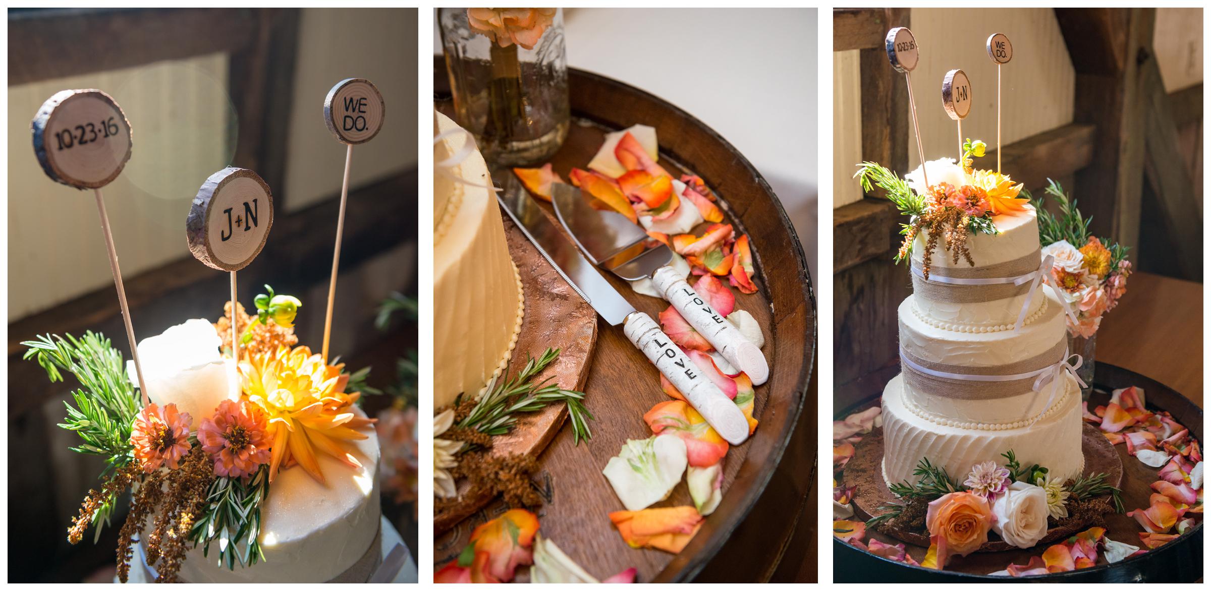 Rustic cake on barrel table with wooden topper and cake cutter.