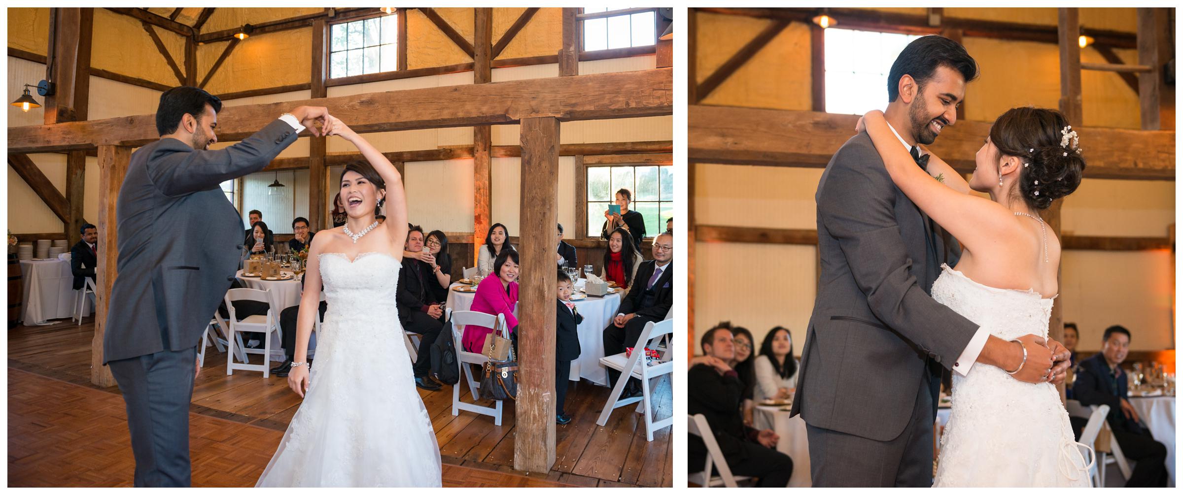 Bride and groom have their first dance during rustic barn reception at Stoneleigh Golf Club in Round Hill, Virginia.