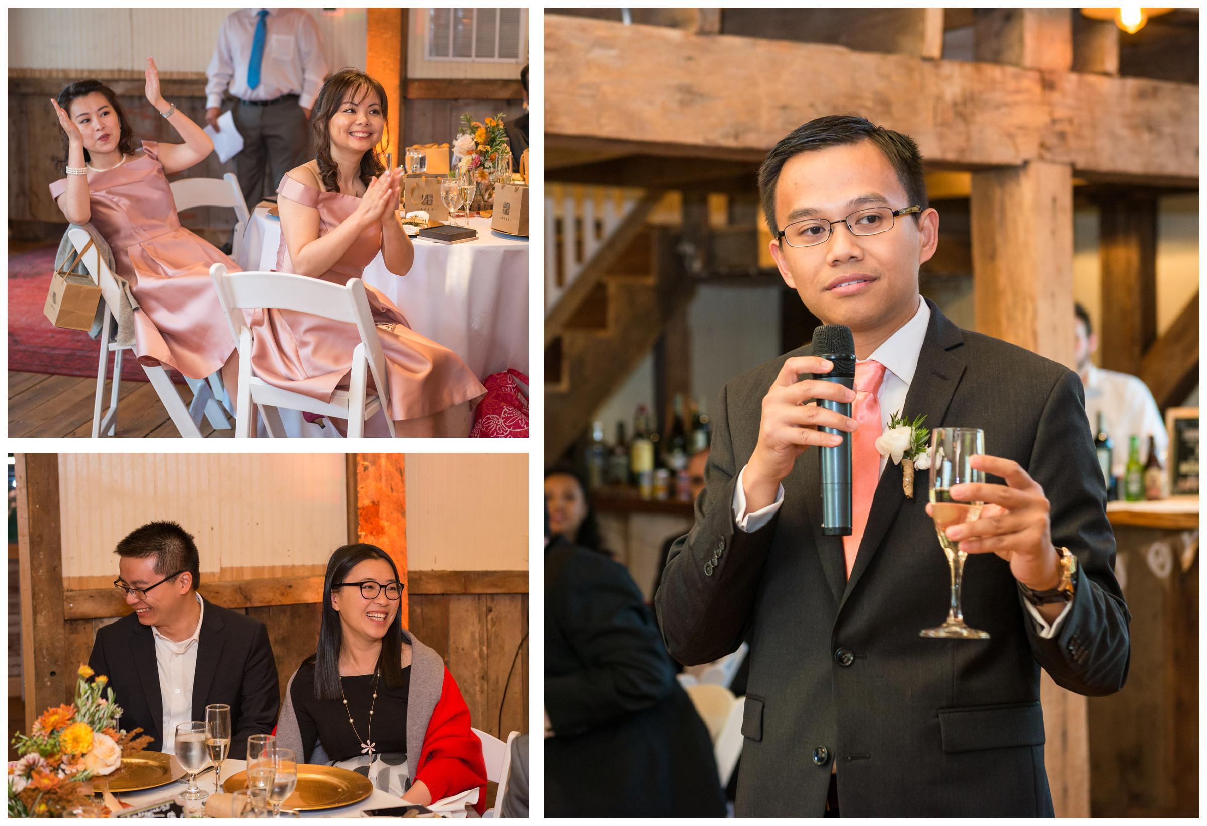 Groomsman gives toast during rustic barn wedding reception.