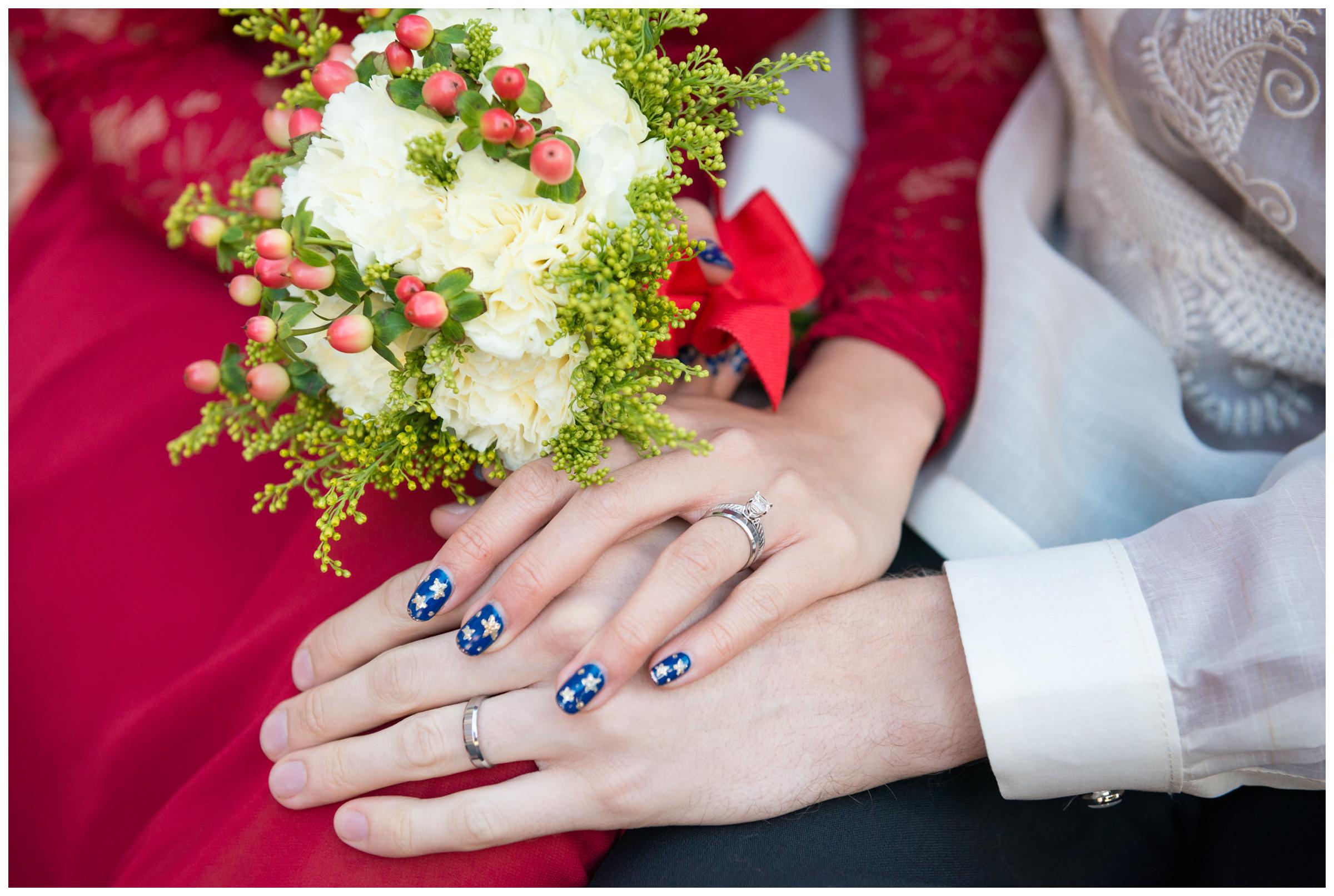 bride and groom wearing wedding rings after marriage ceremony