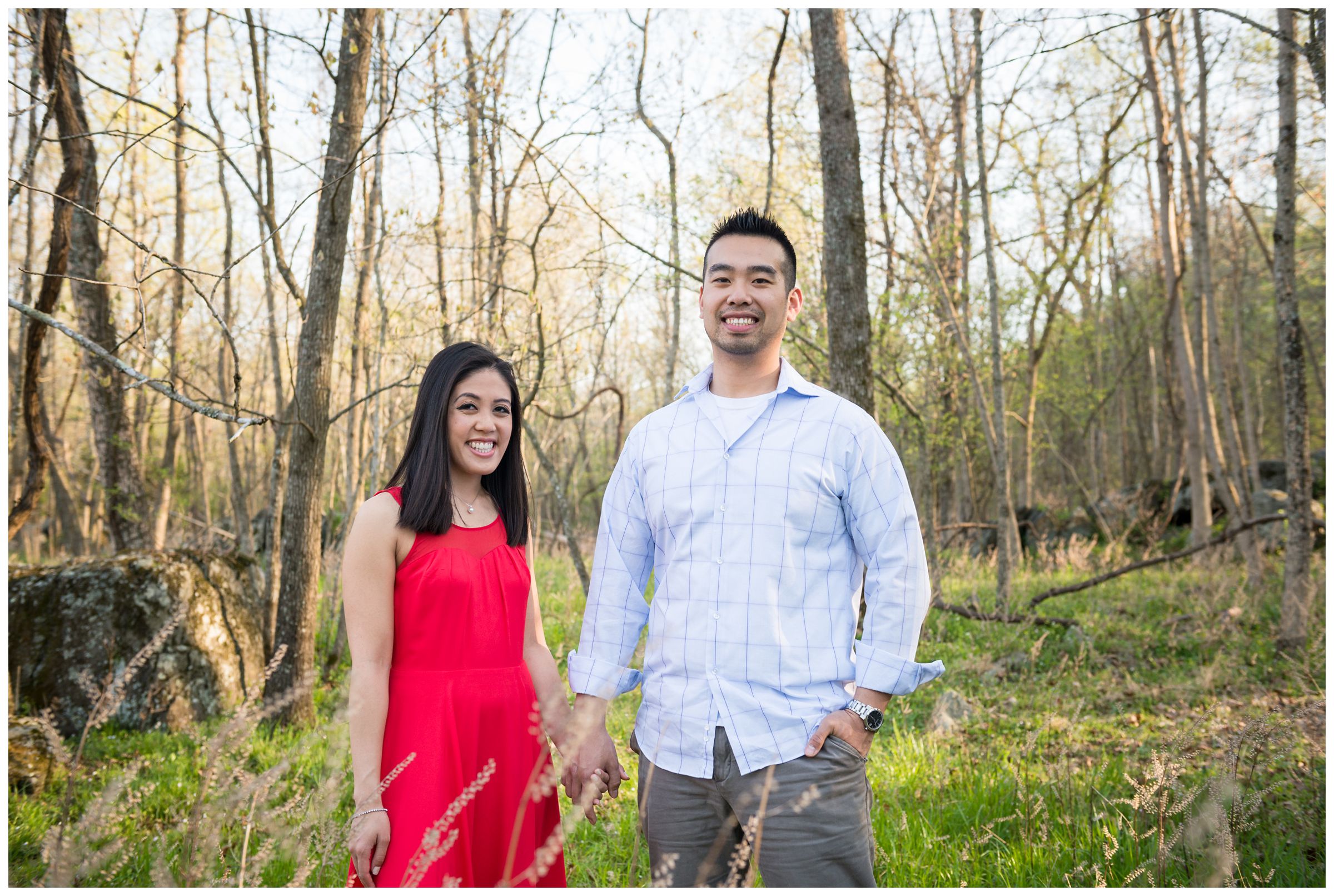 engaged couple in forest at Great Falls Park in Virginia