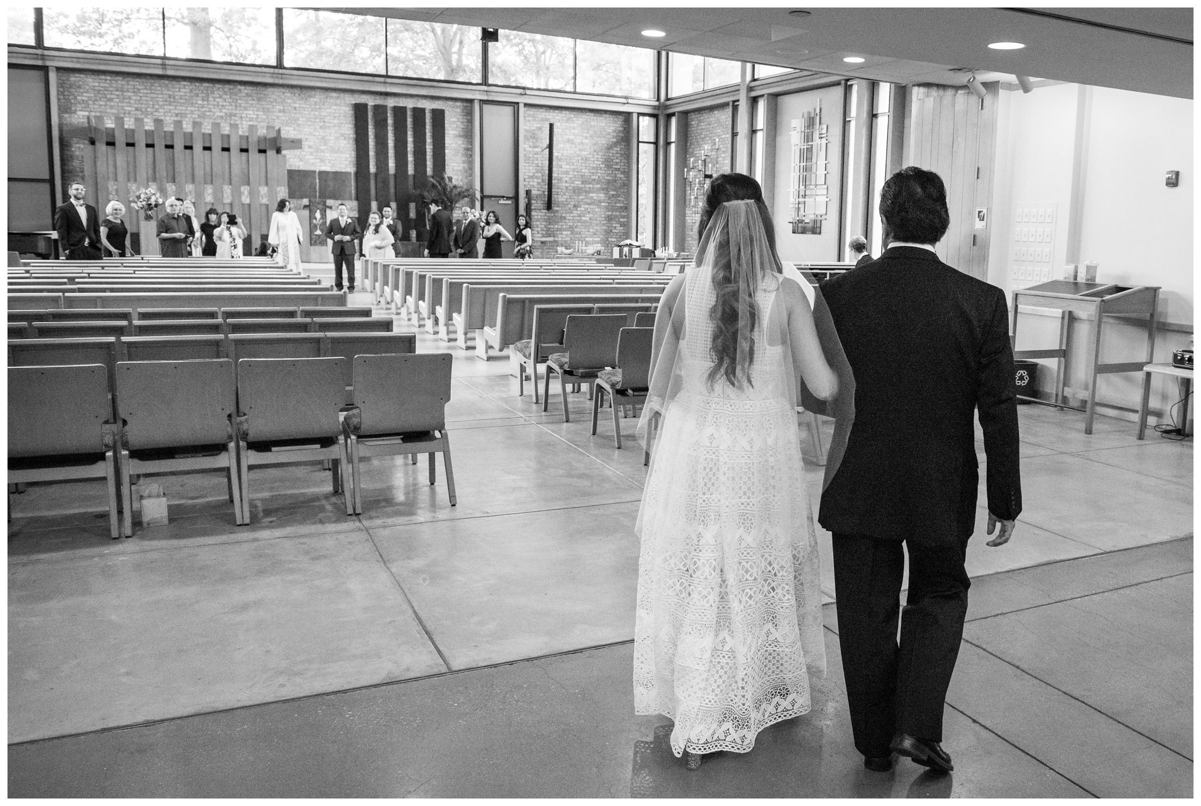 bride and father processional during wedding ceremony at the Unitarian Universalist Church in Arlington, Virginia 