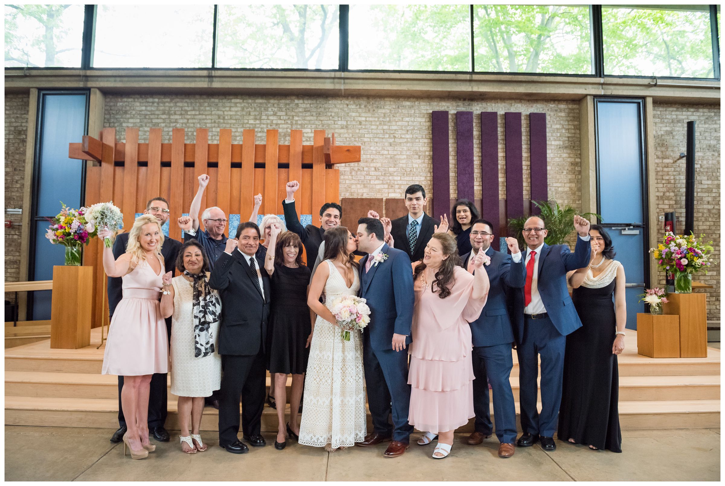 group photo of intimate wedding ceremony at the Unitarian Universalist Church in Arlington, Virginia