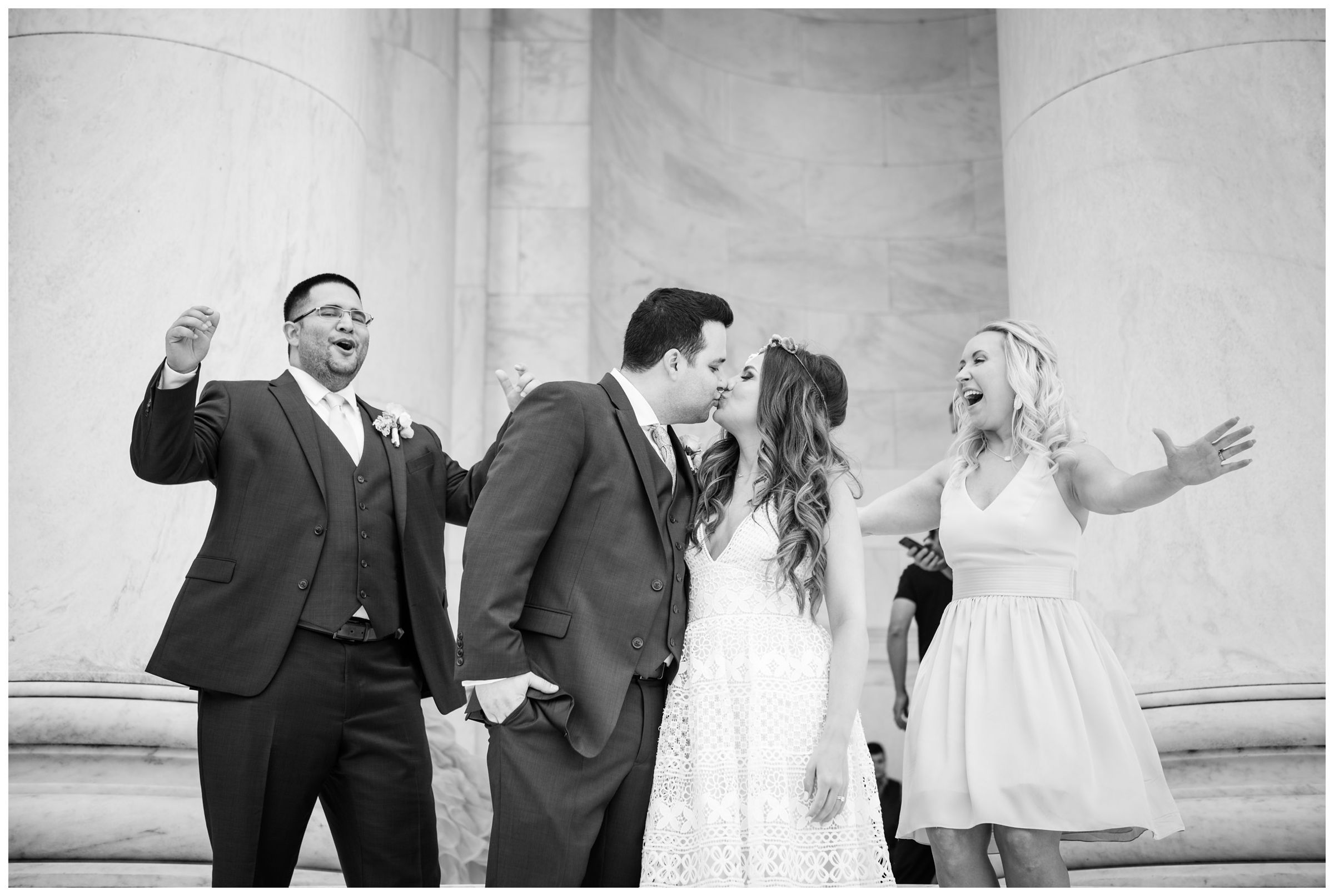 bride and groom with best man and matron of honor at Jefferson Memorial on the National Mall in Washington, D.C.