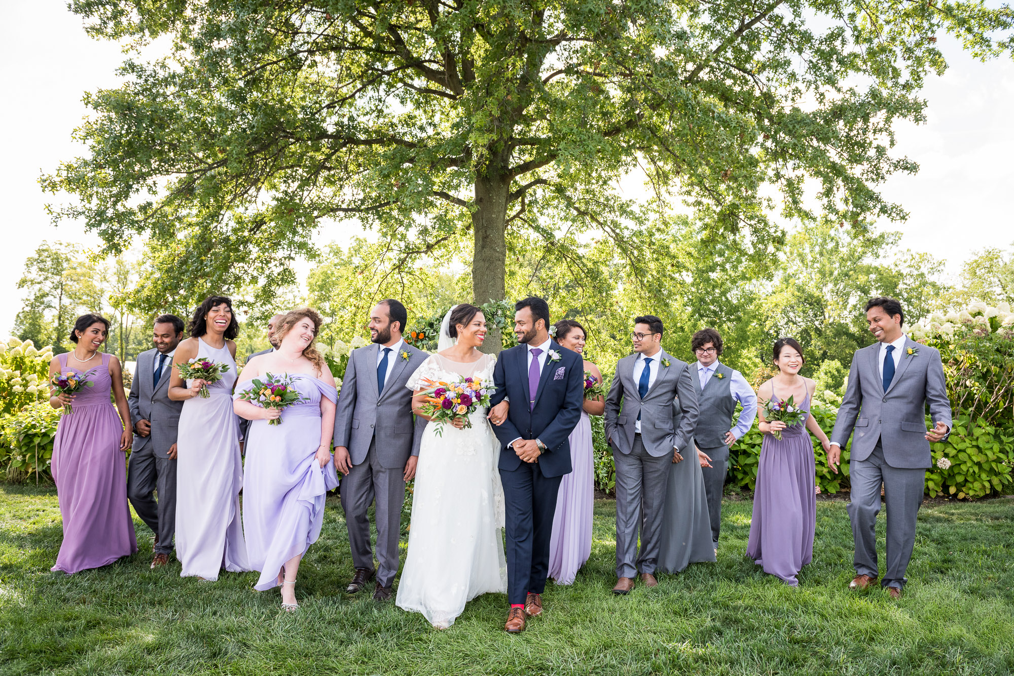 diverse co-ed mixed gender wedding party at Jorgensen Farms in Columbus