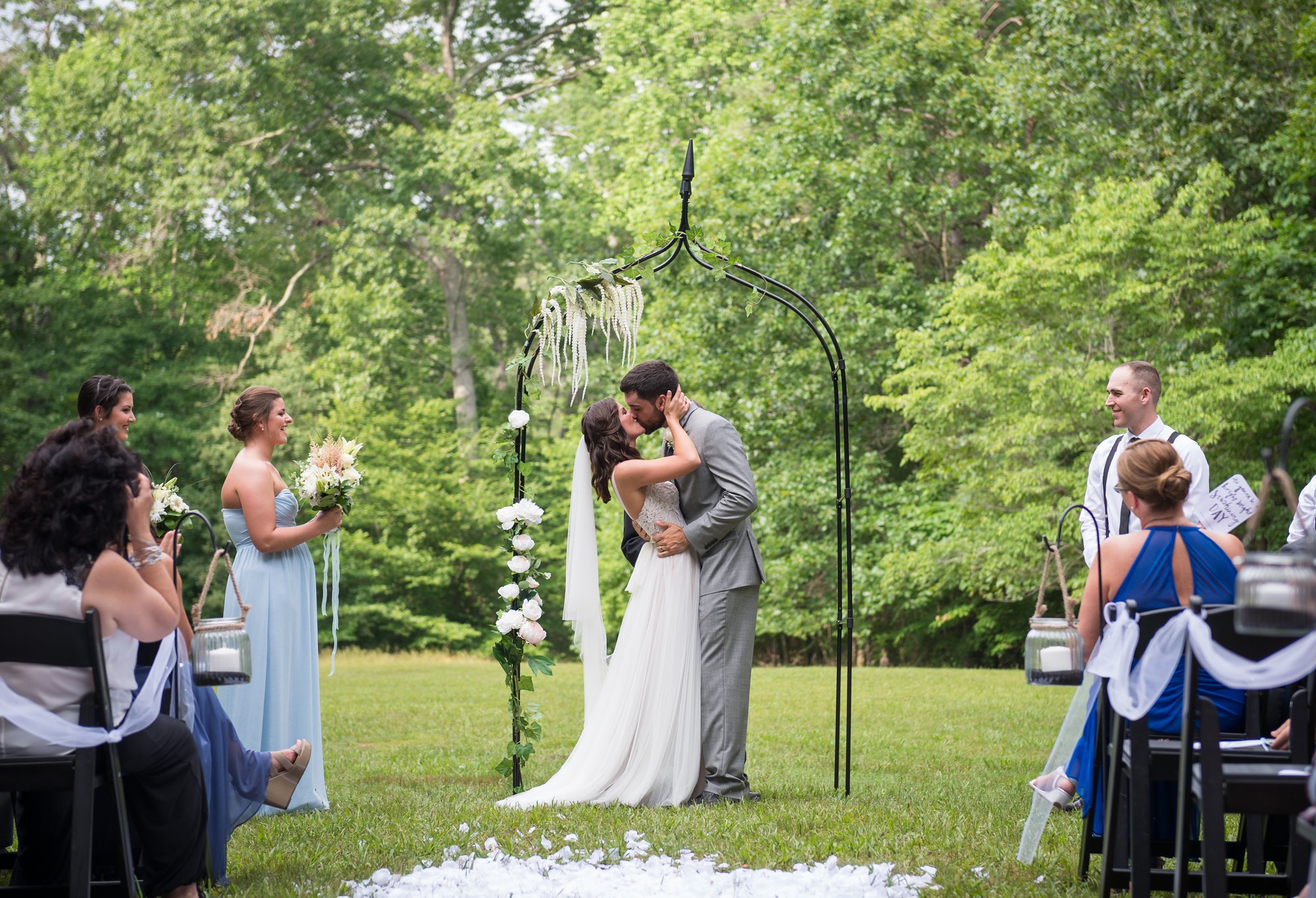 first kiss at outdoor wedding in Columbus Ohio