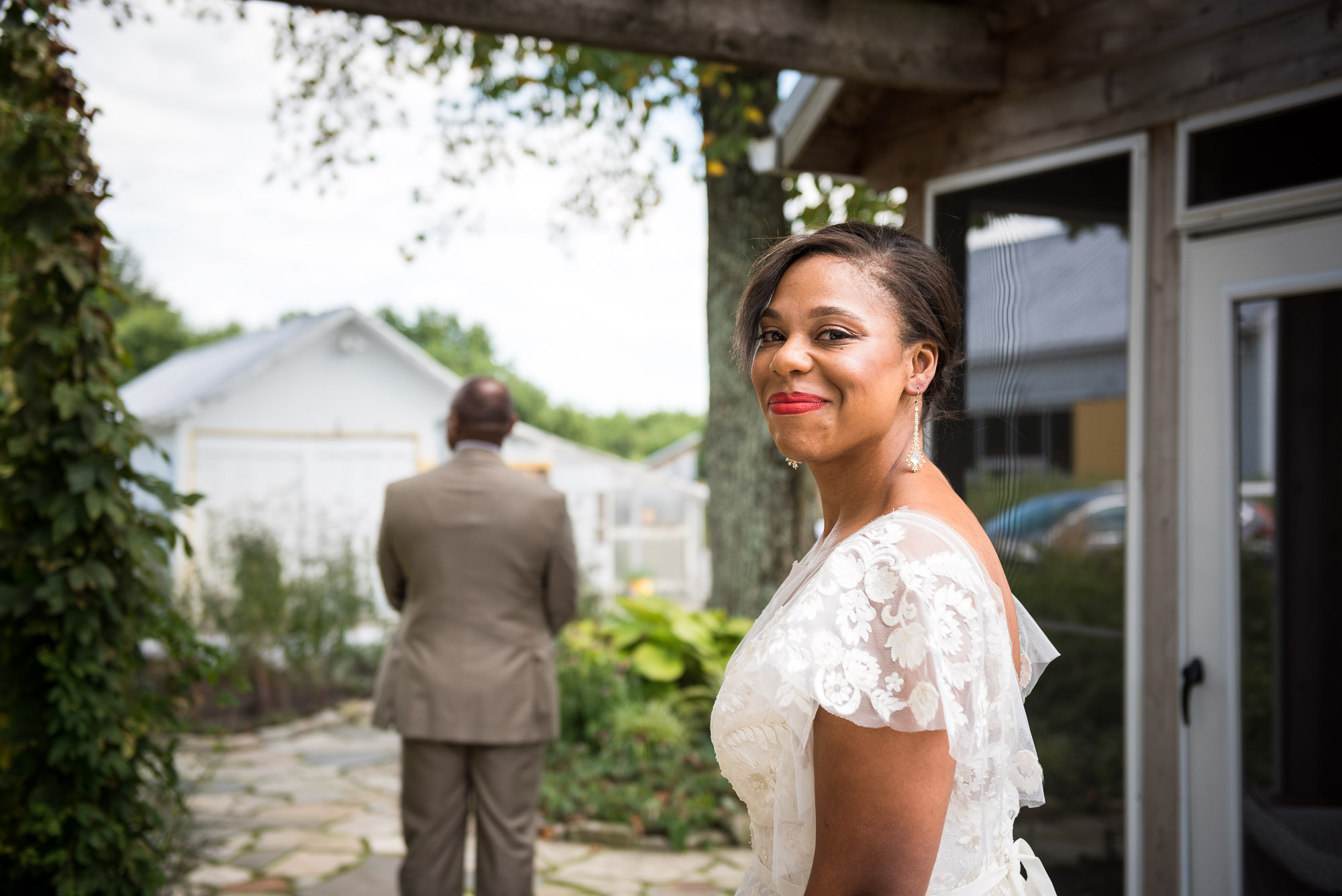 African American wedding photo of bride and father first look