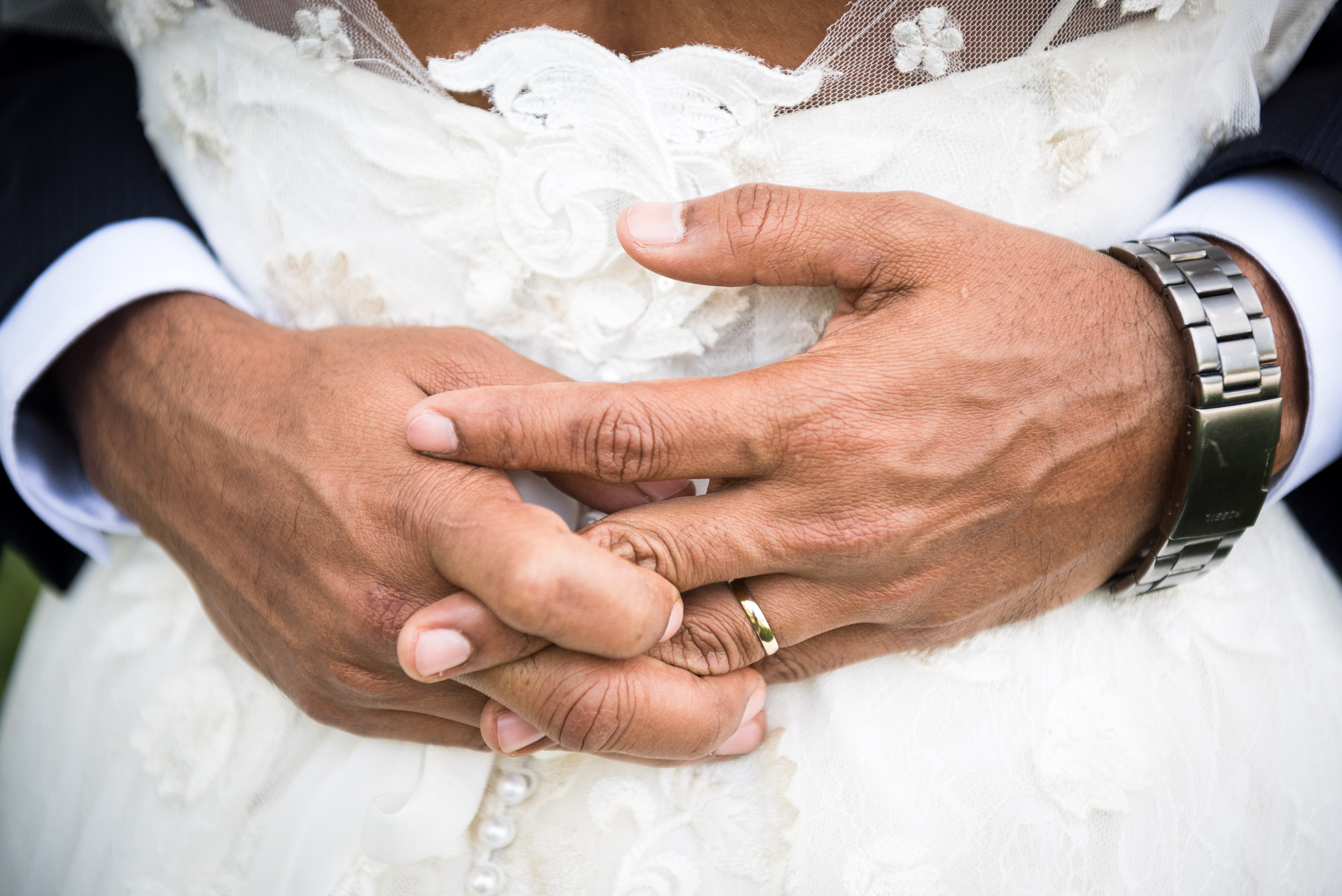 photo of groom's hands around bride by Columbus wedding photographer