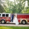 bride and groom wedding photo with firetruck