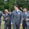 groom laughing with groomsmen on wedding day