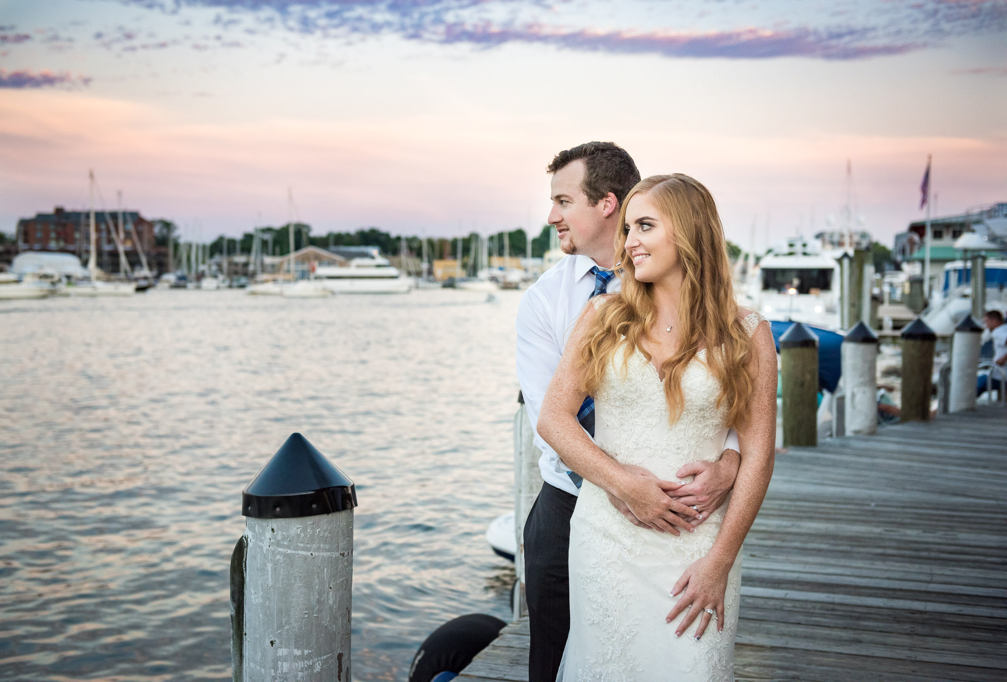 bride and groom at sunset during waterfront wedding in Annapolis, Maryland